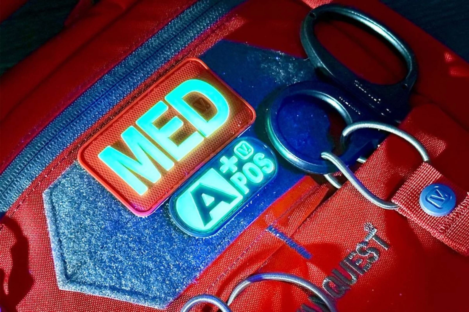 Tourniquet holder & medical patches: quick access & clear ID for lifesaving supplies.